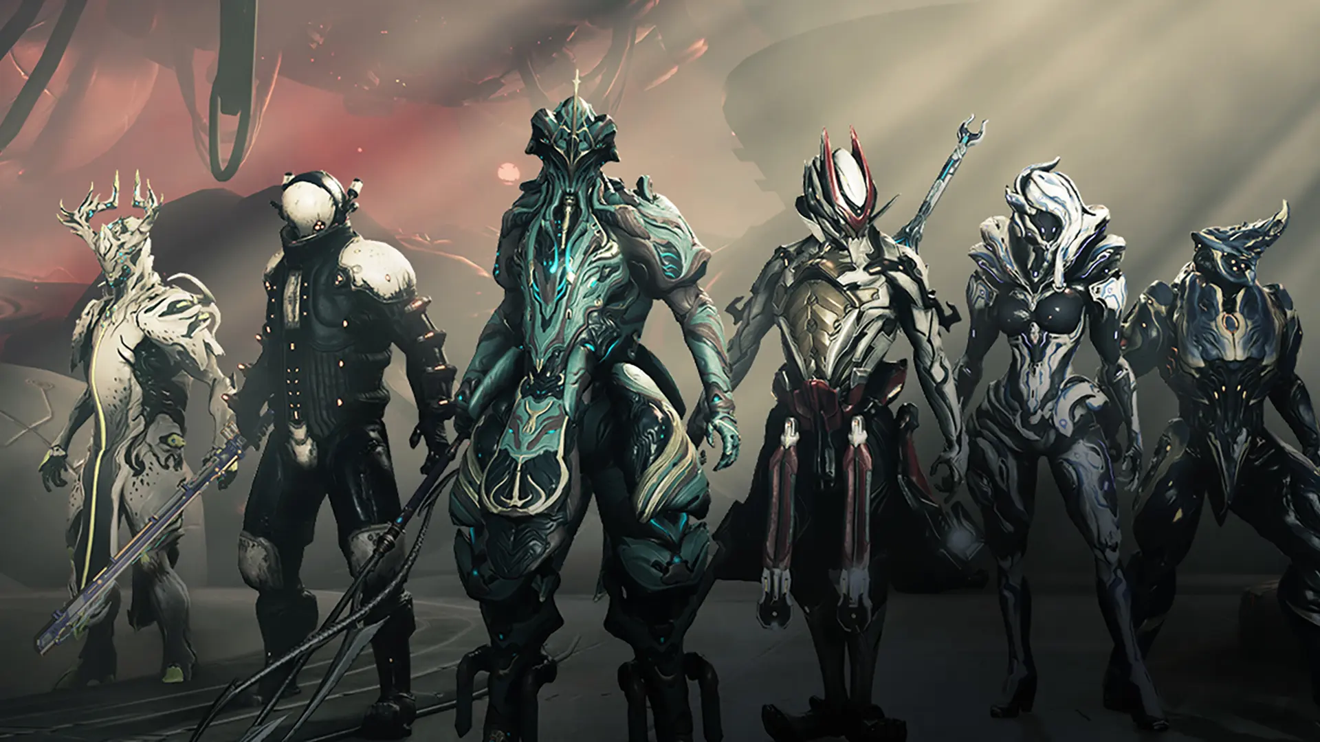 A lineup of Warframe characters showcasing their unique designs and weapons.