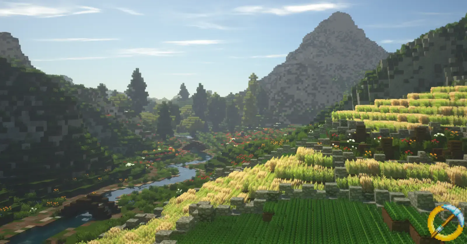 Scenic Minecraft landscape with mountains, greenery, and a river.