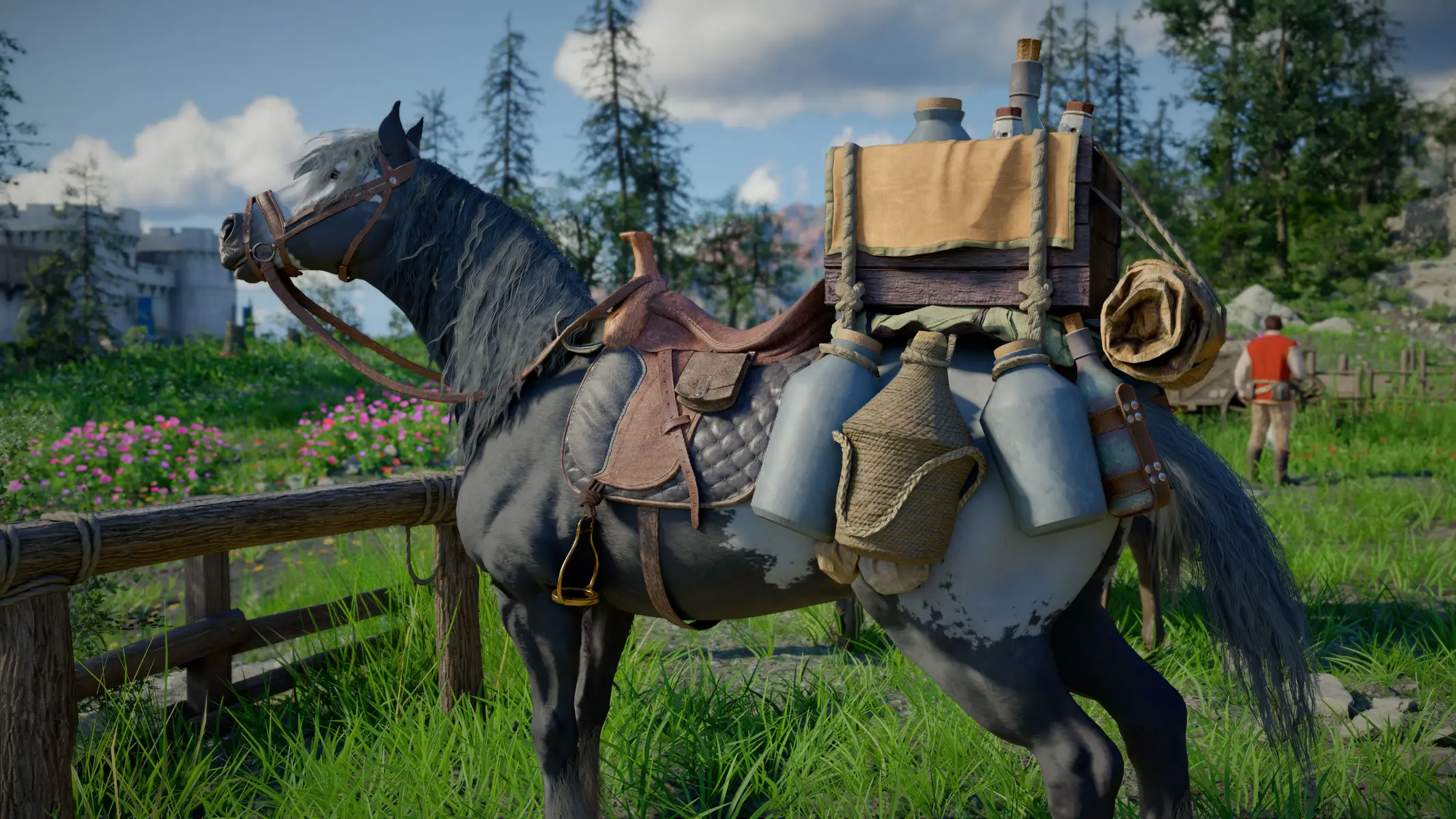 A grey horse equipped with leather saddles, bedrolls, and supply jugs in a grassy outdoor setting