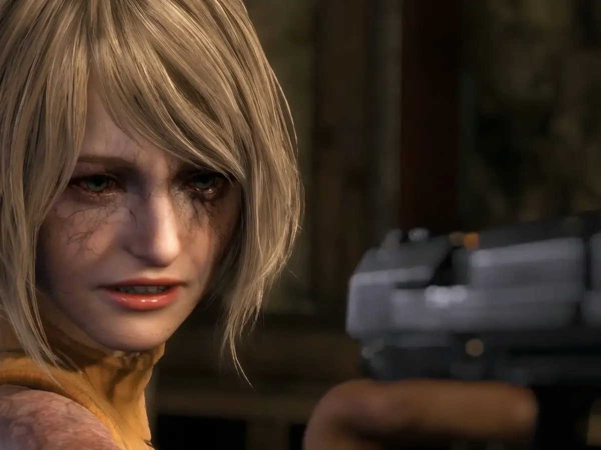 Close-up of a modified Ashley Graham from Resident Evil 4 Remake with dark veins on her face and a gun in the foreground