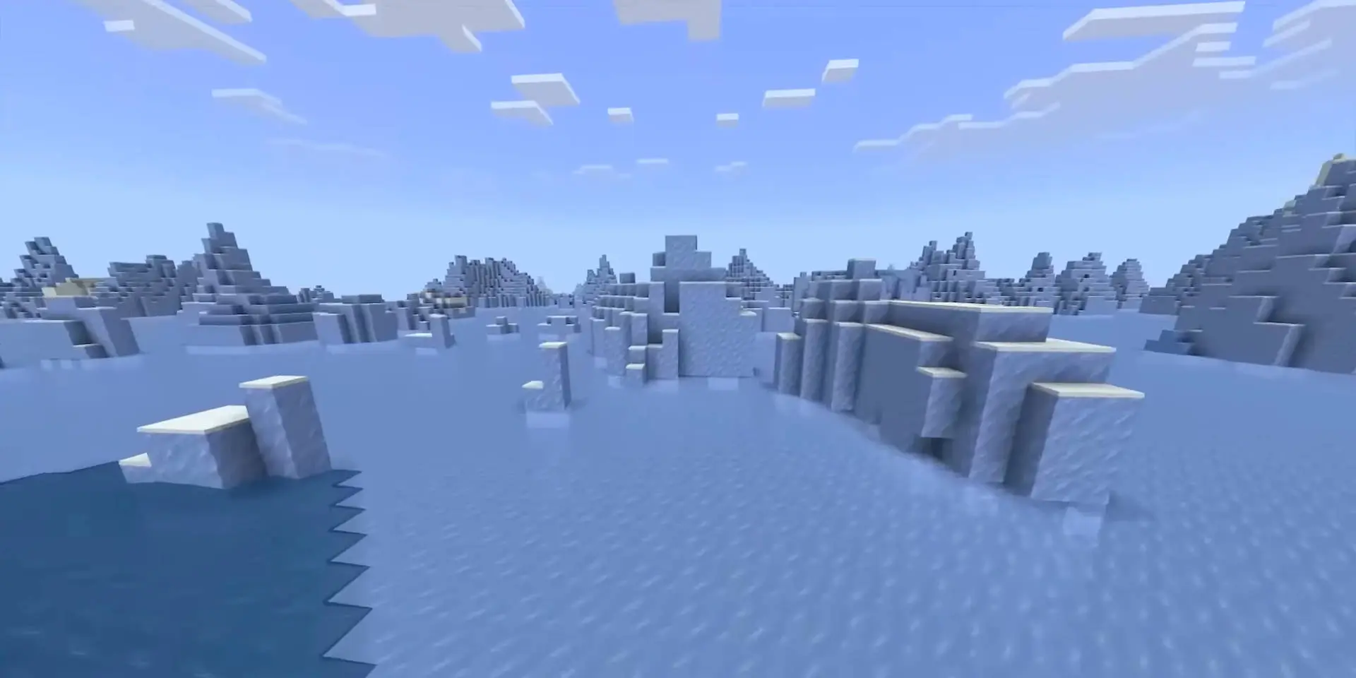 Замерзший океан в игре Minecraft с ледяными глыбами и горами на горизонте